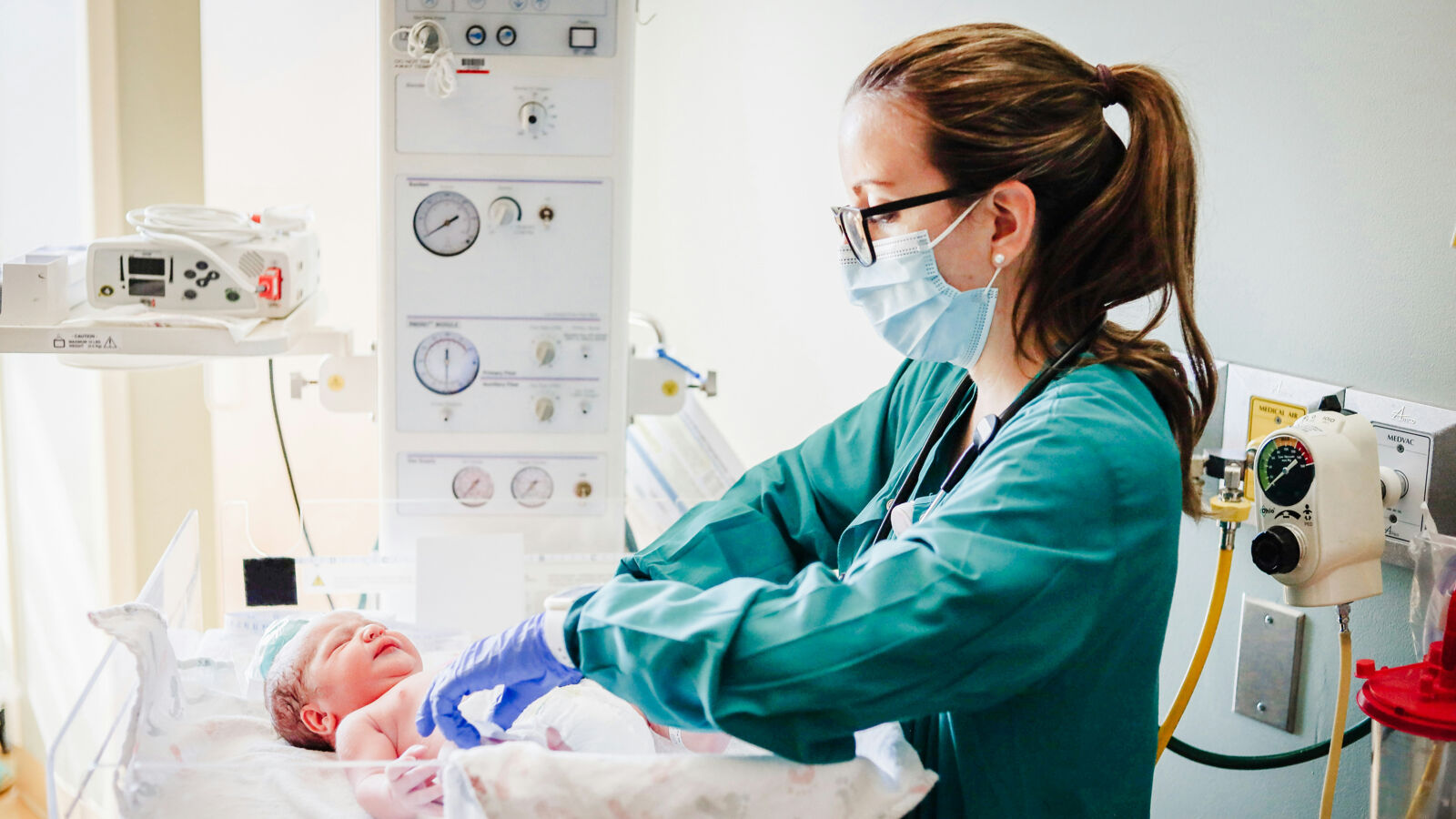 Medical professional analyzing diagnostic samples in laboratory