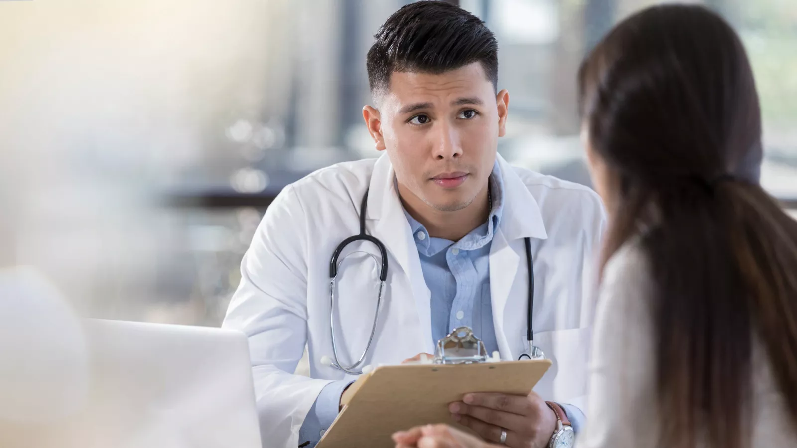 Medical professional with patient consultation